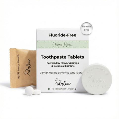 Tidalove fluoride-free toothpaste tablets with packaging on a white background