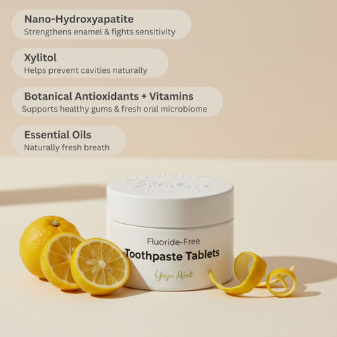 Fluoride-Free Toothpaste Tablets container with lemons on a beige background