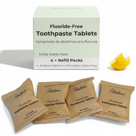 Fluoride-Free Toothpaste Tablets packaging with yellow yuzu peel on a white background