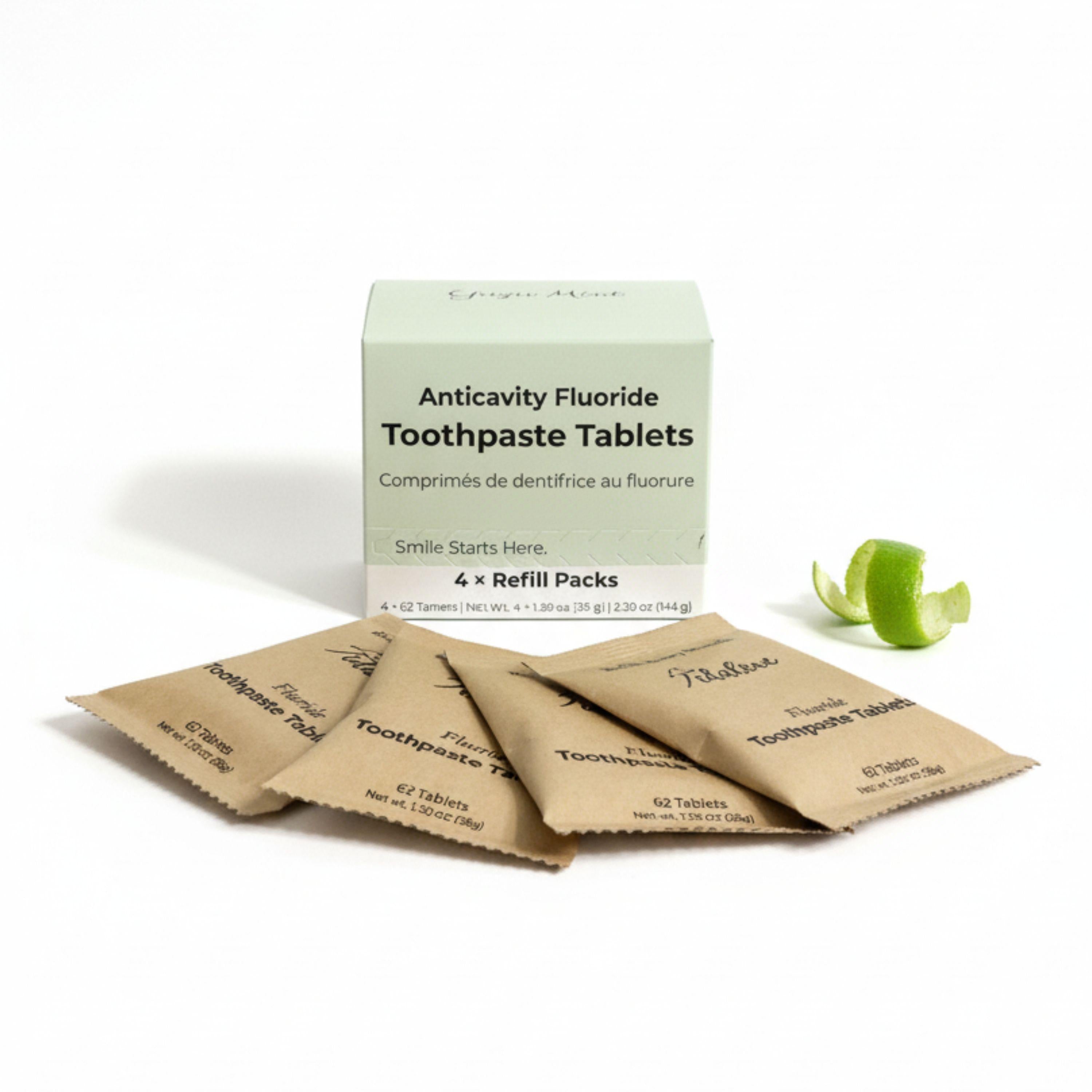 Anticavity fluoride toothpaste tablets with packaging on a white background